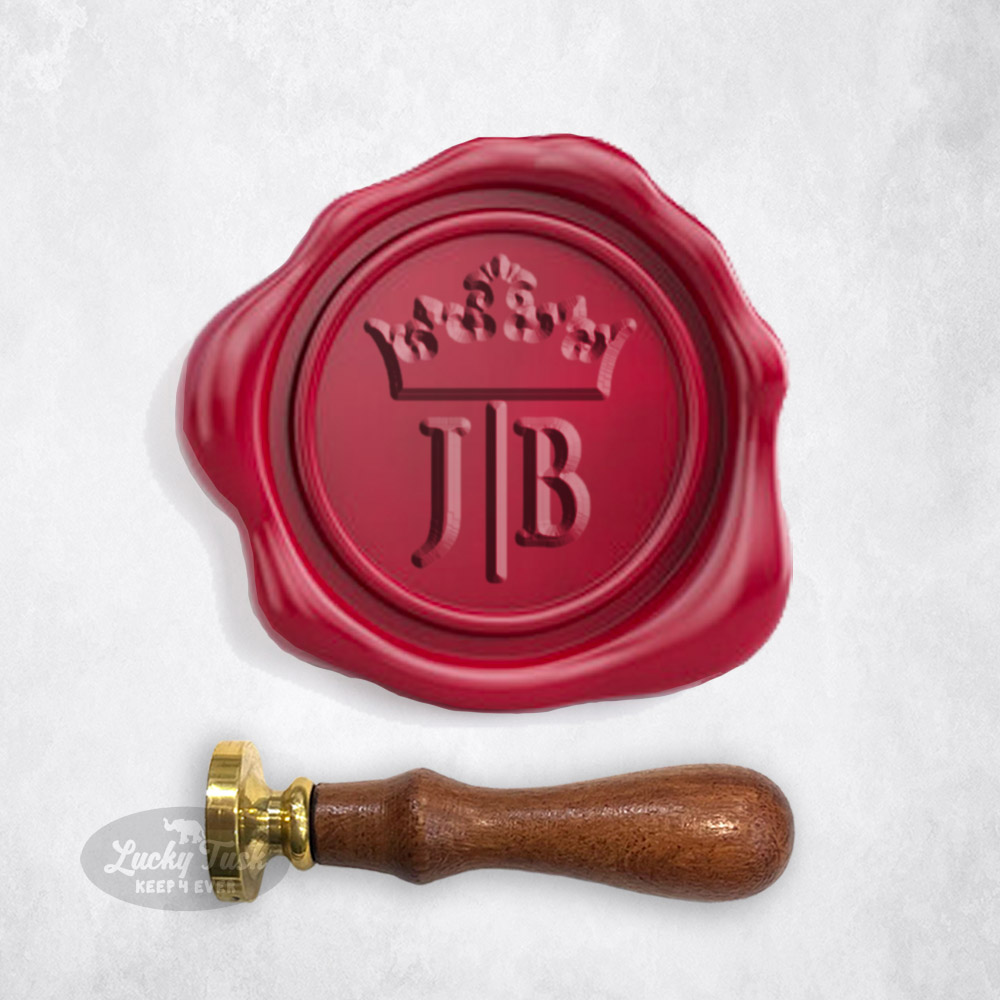 Custom wax seals for wedding invitation jackets inside tin boxes